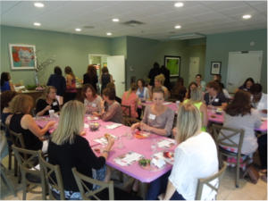 St. Louis home filled with Friends of Mercy guests.