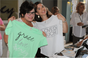 Friends from Asbury United Methodist Church finding goodies at resource table in Nashville home.