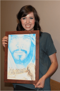 Mercy gifted Battistelli with an original art piece by Karen Harvey.