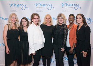 Nancy Alcorn and Natalie Grant with Jeanne Waters-Hill (in white) and the Touché Design Group