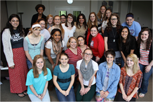 Lisa Bevere (back, center) posed with Mercy residents in the Nashville home.